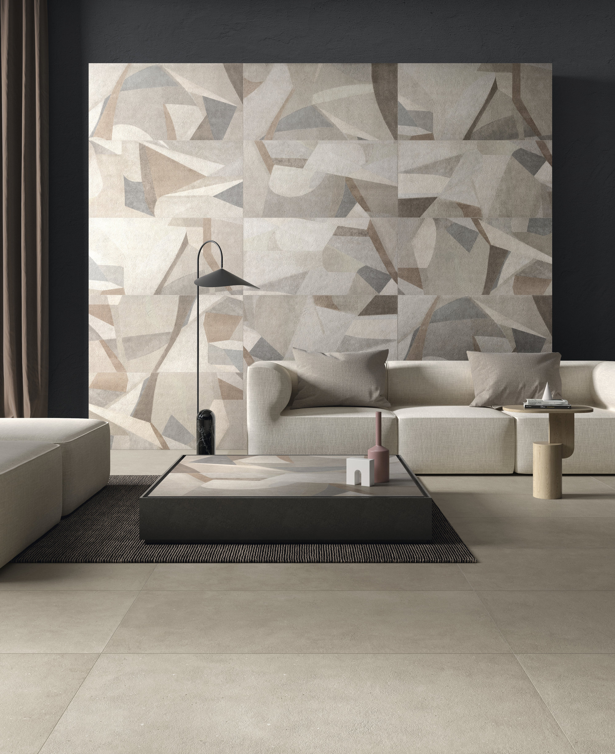 Salon moderne avec carreaux muraux Porcelaingres au design géométrique et carreaux de sol assortis.