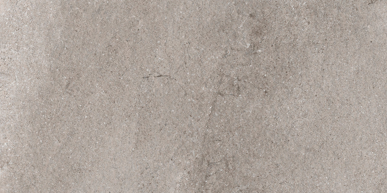 Mystic Grey Carreau en grès cérame clair aspect béton mat.