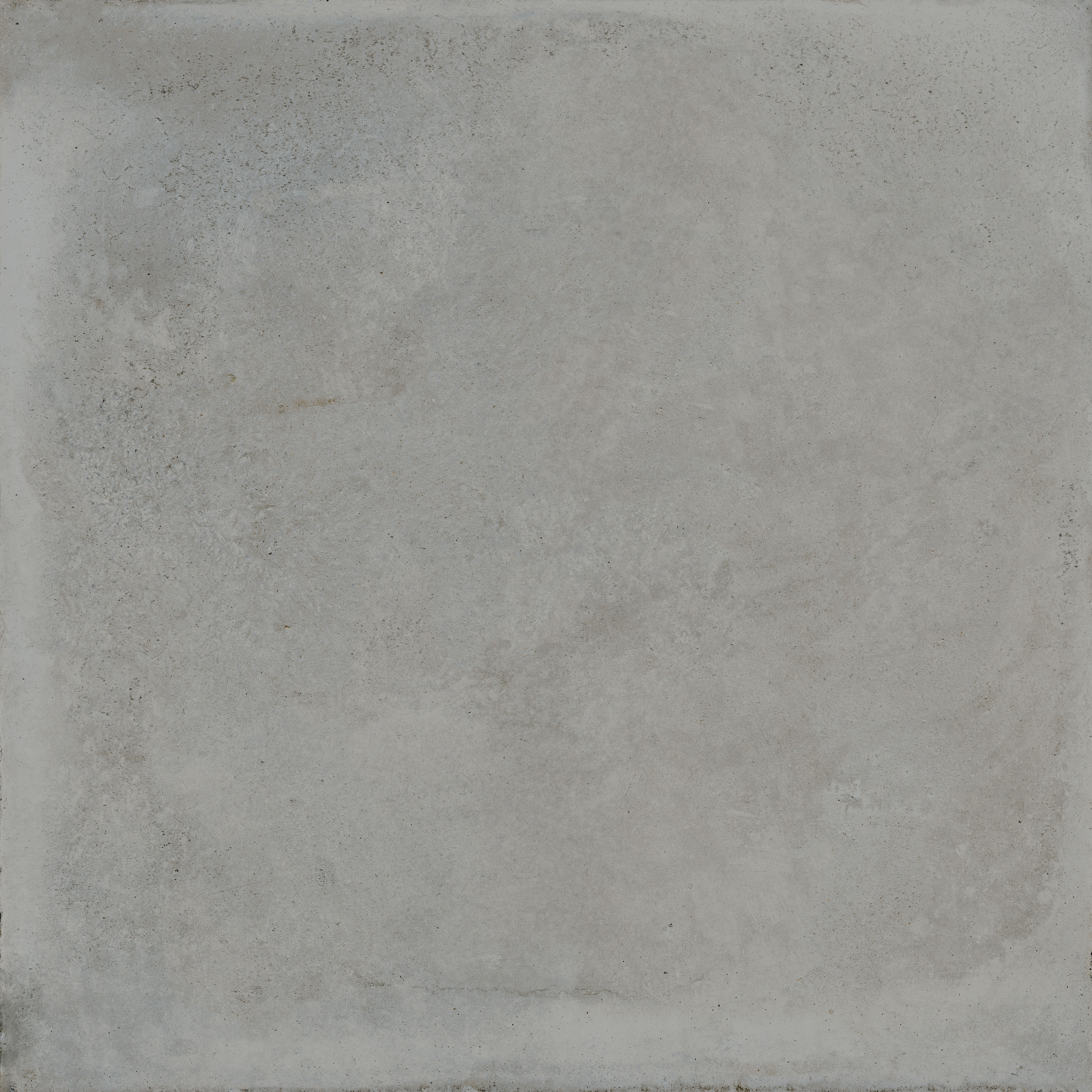 : Carreau gris foncé effet béton.