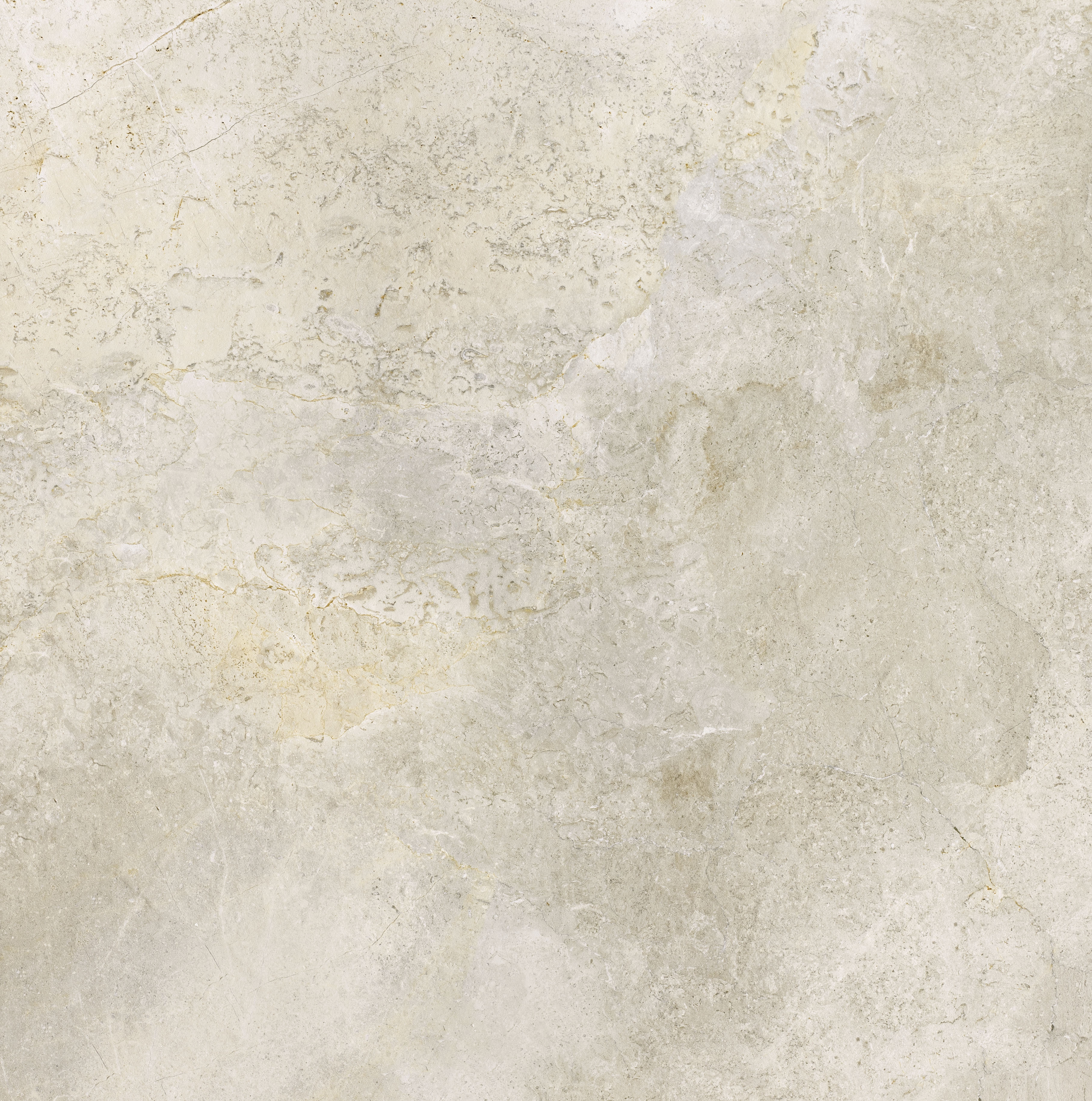 : Gros plan d'un carreau beige clair à la texture fine.