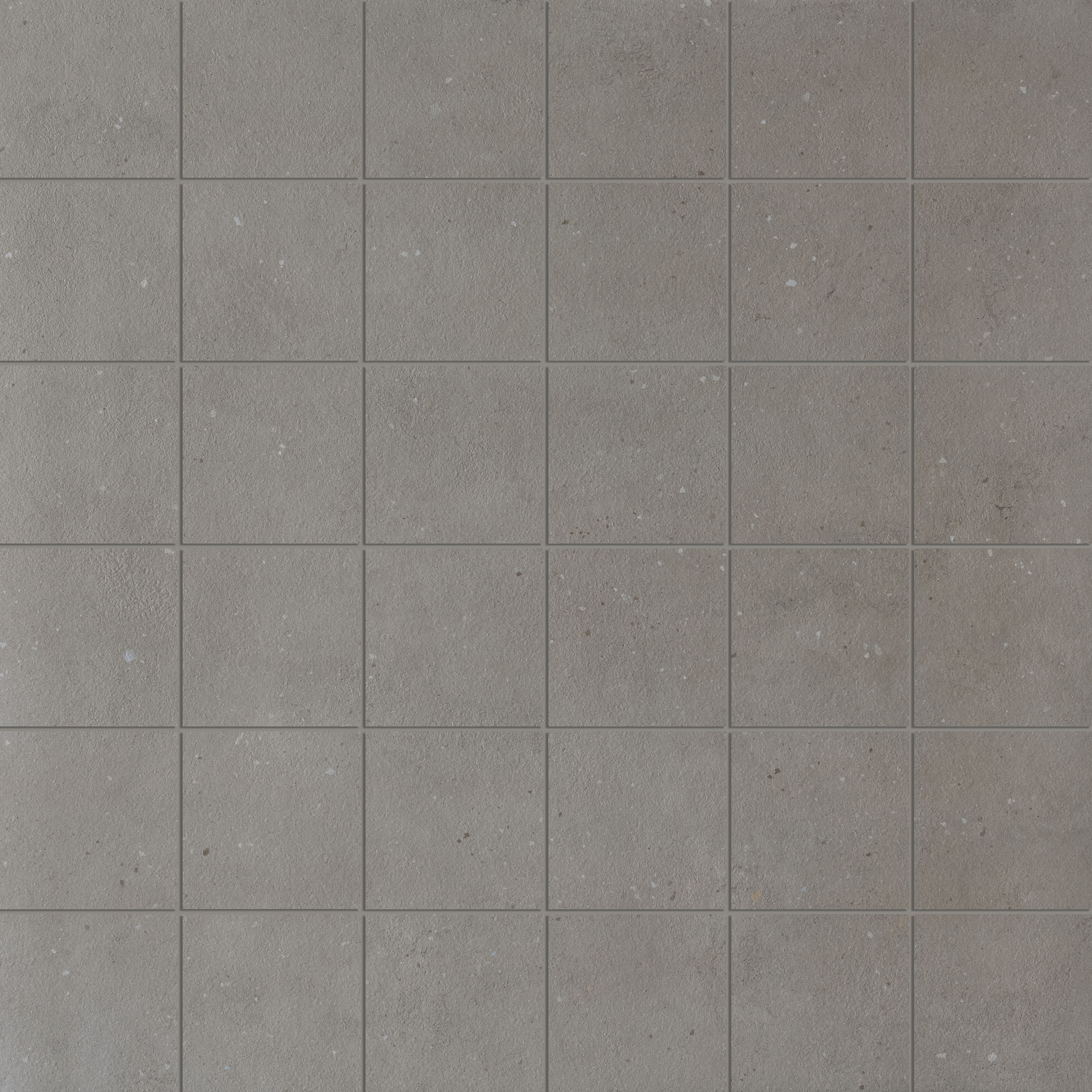 Mosaic 4,7x4,7 Lava Surface de carrelage grise et floue.