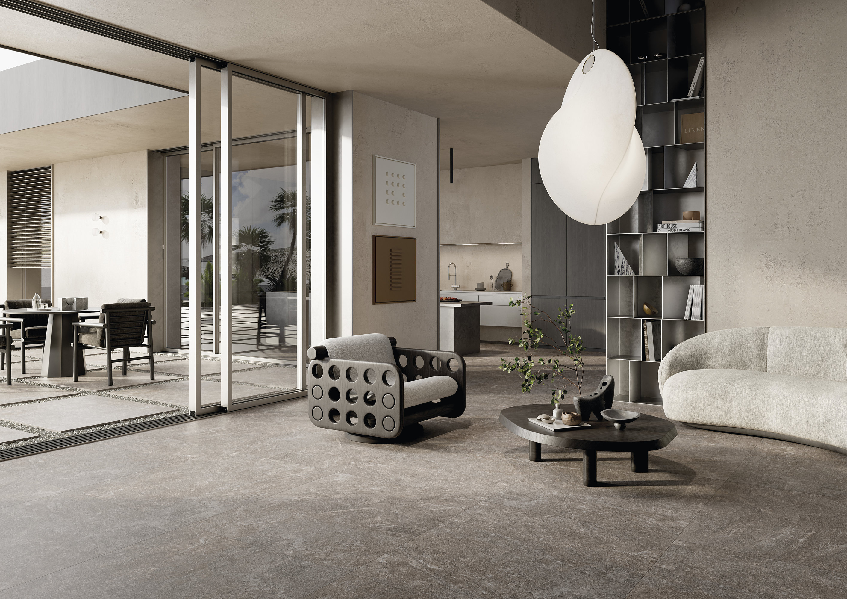 Grandes dalles grises dans un salon luxueux avec portes-fenêtres.