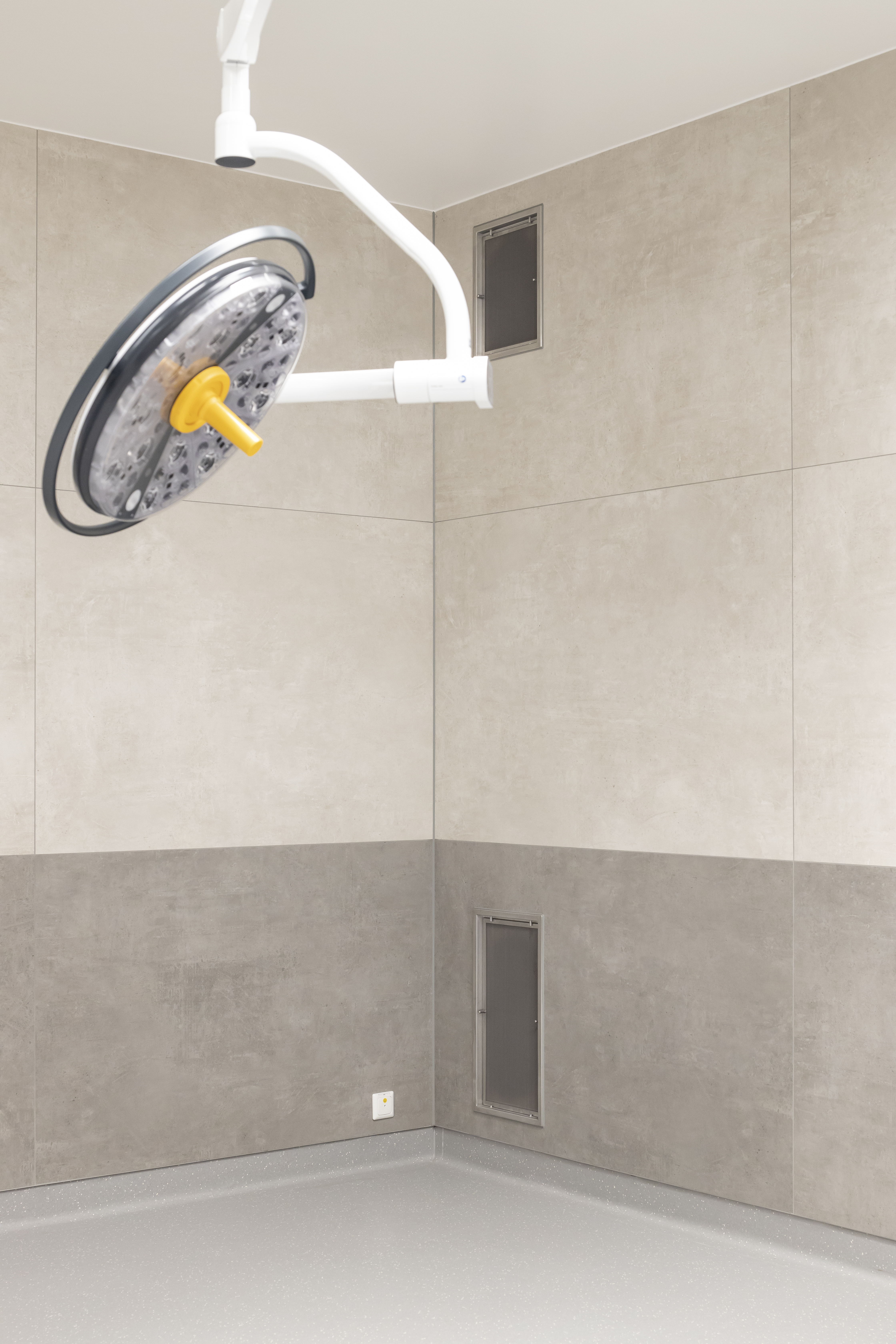 Carreaux muraux haut de gamme bicolores gris pour un intérieur moderne et épuré.