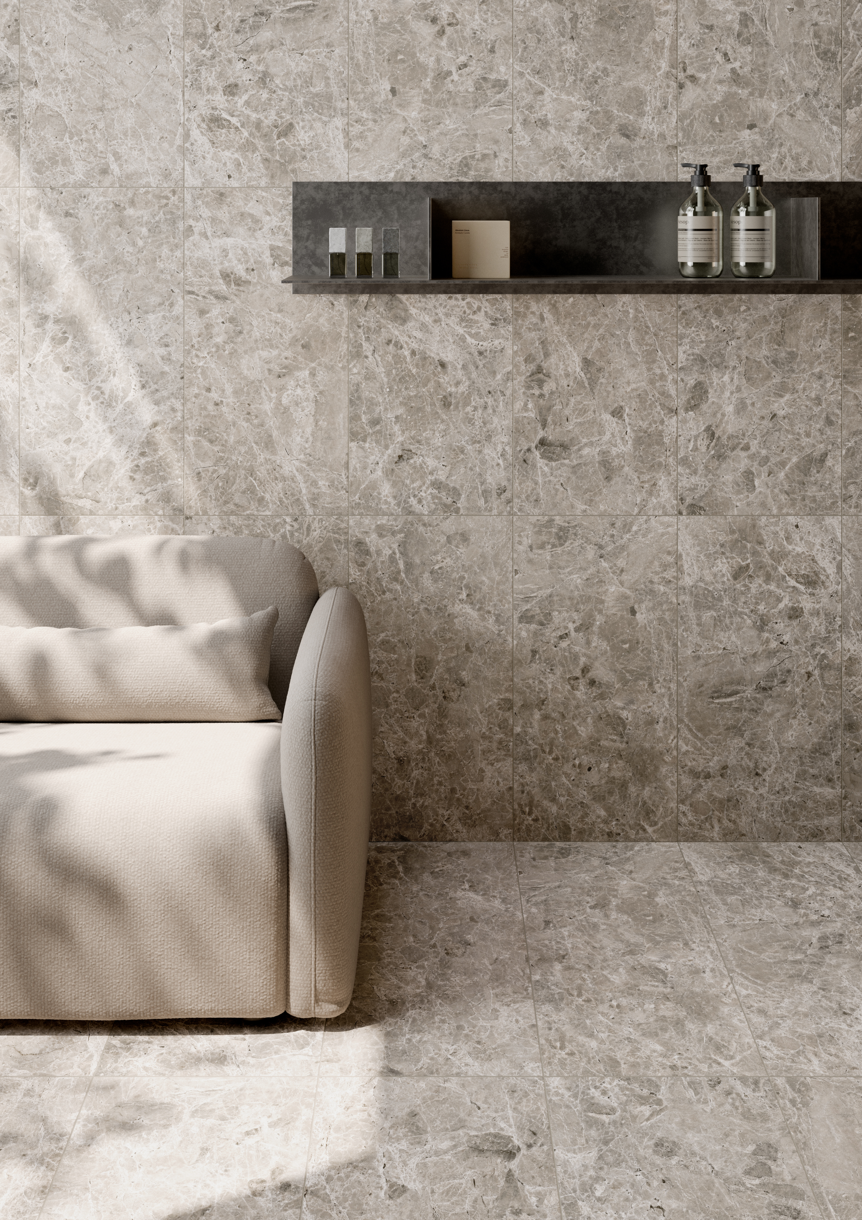 Salon avec élégants carreaux gris effet marbre Porcelaingres murs et sols.