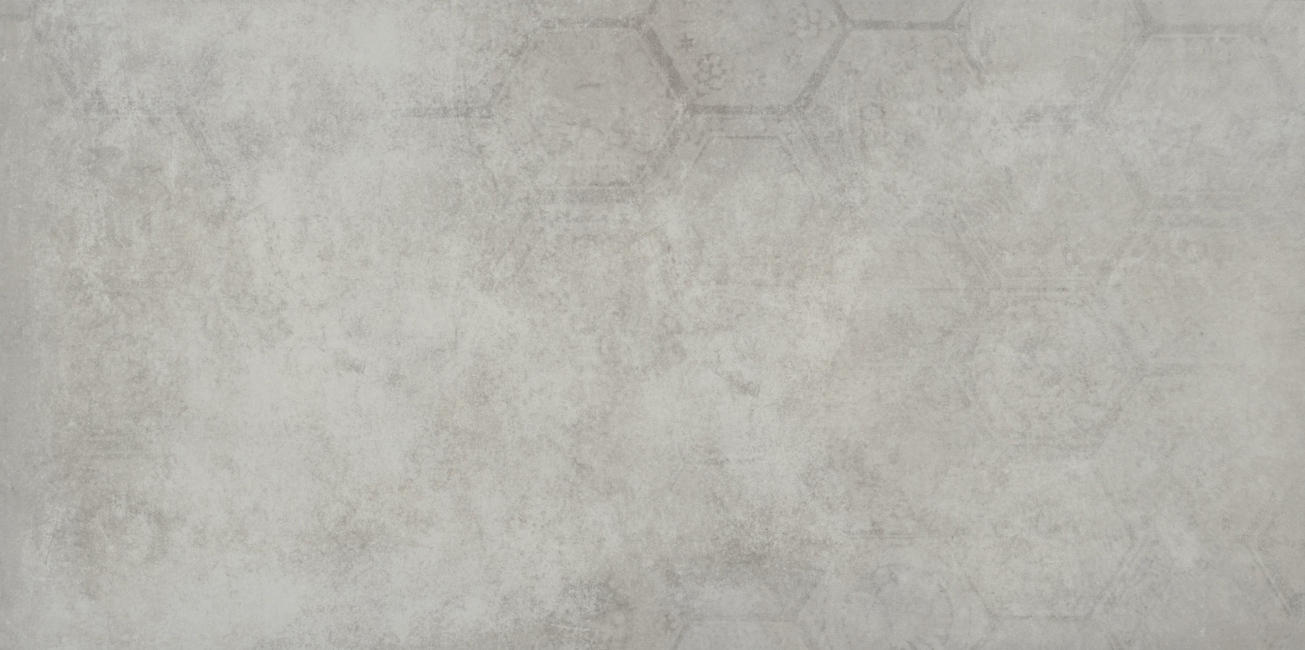 : Carrelage gris clair aspect béton avec motif nid d'abeille discret.