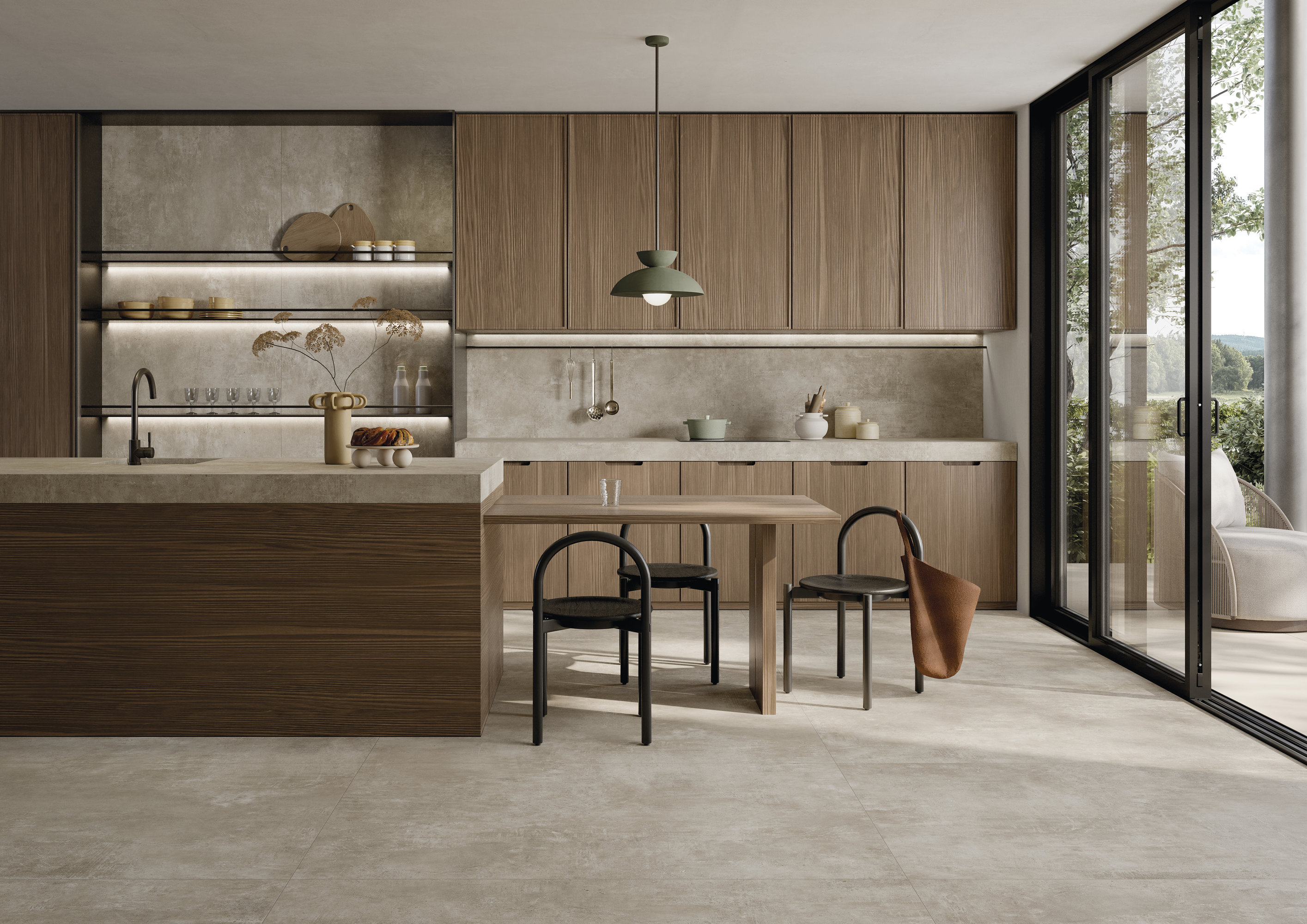 Carreaux de sol clairs dans une cuisine moderne avec des éléments en bois et accès à la terrasse.