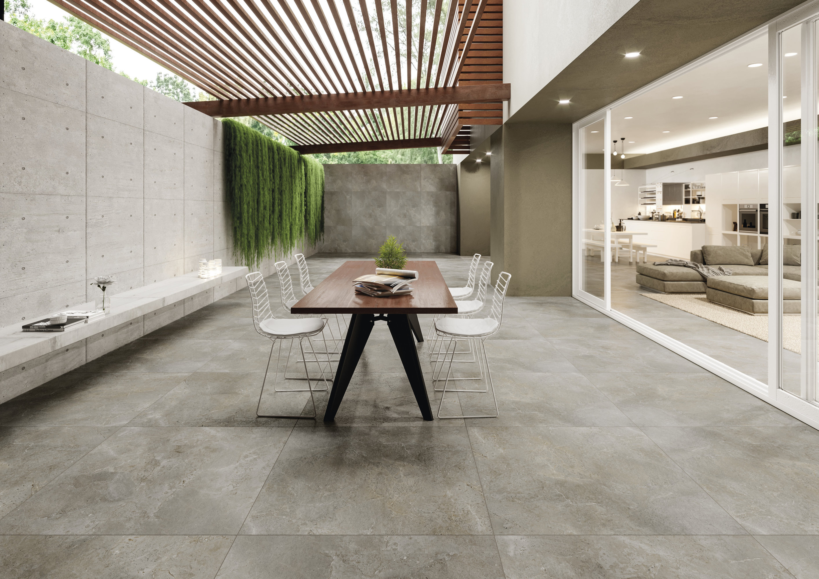 Carreaux gris modernes intérieur/extérieur sur terrasse élégante.