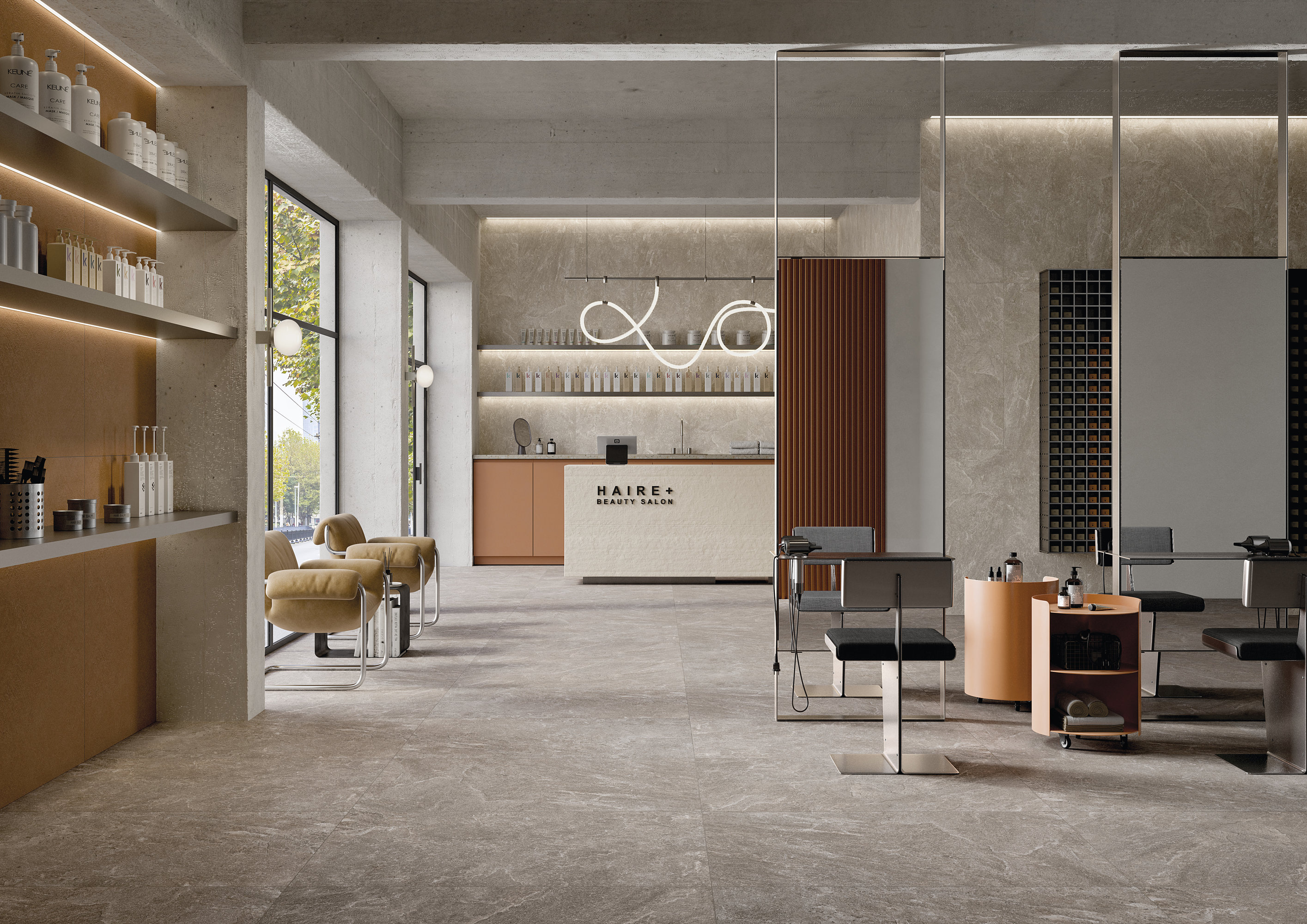 Großformatige, hellgraue Fliesen im Betonlook in einem modernen Salonambiente.