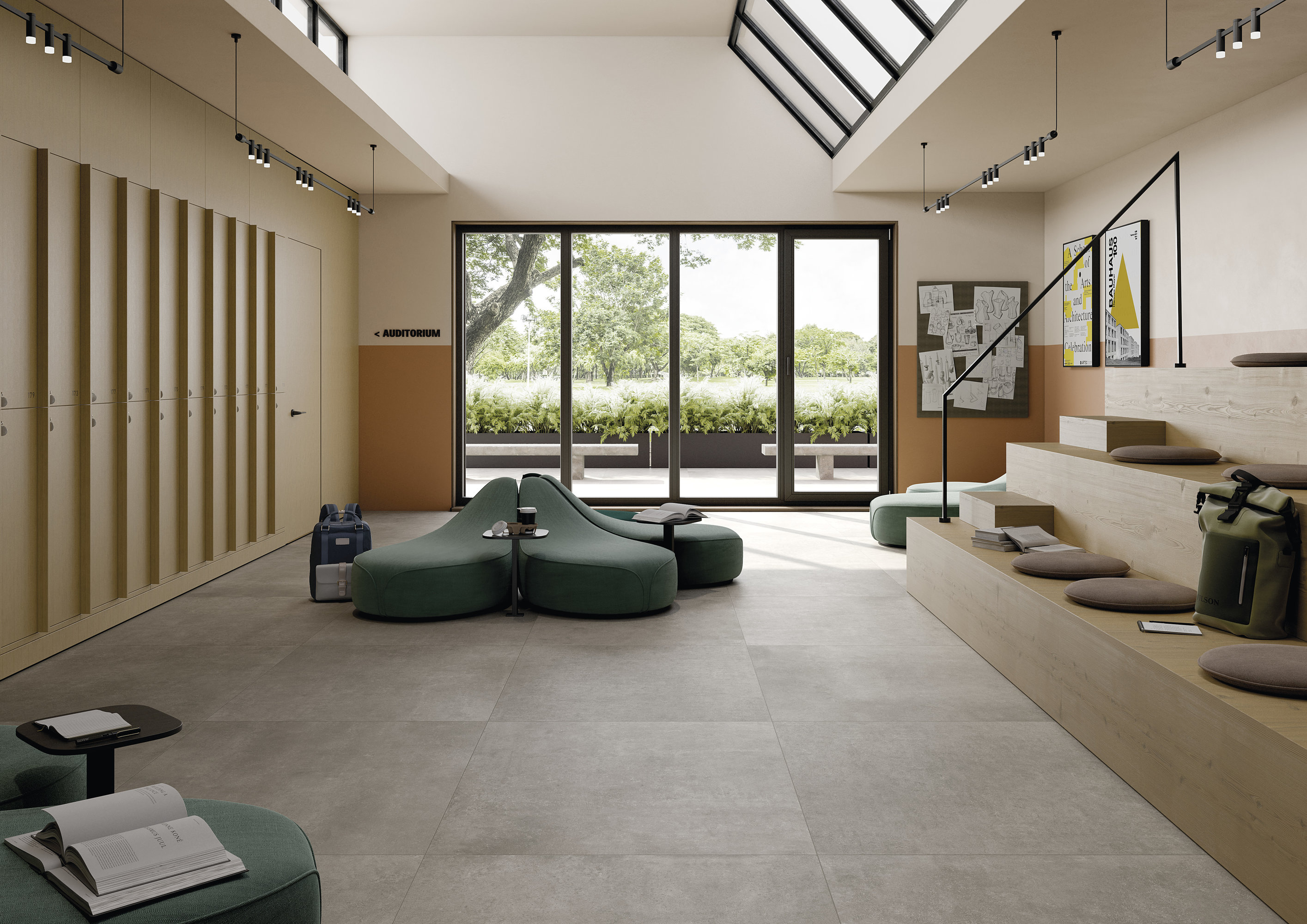 Hochwertige, großformatige graue Fliesen in einem modernen, hellen Loungebereich.