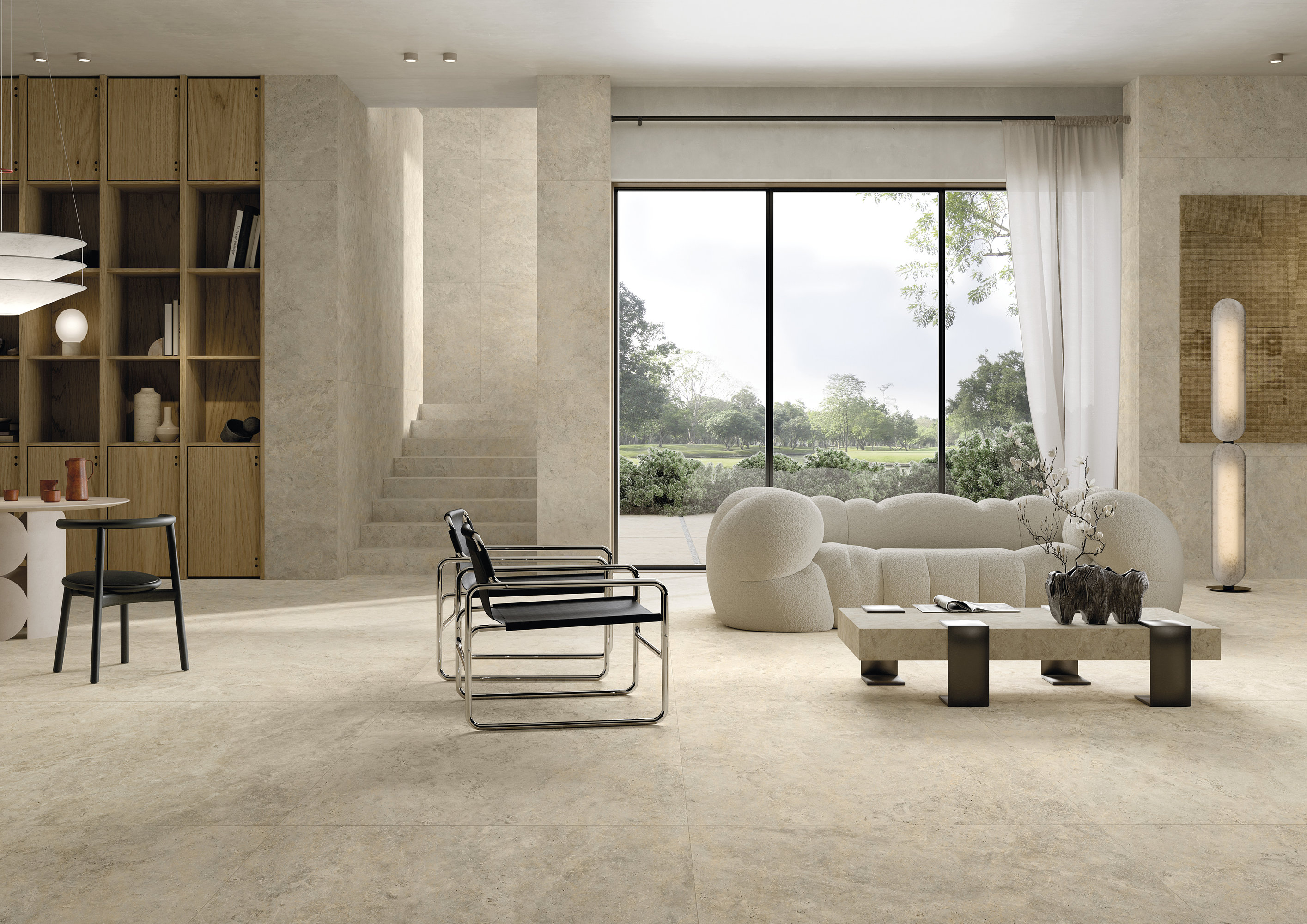 Grand salon avec carrelage beige de Porcelaingres ou Schöner Wohnen.