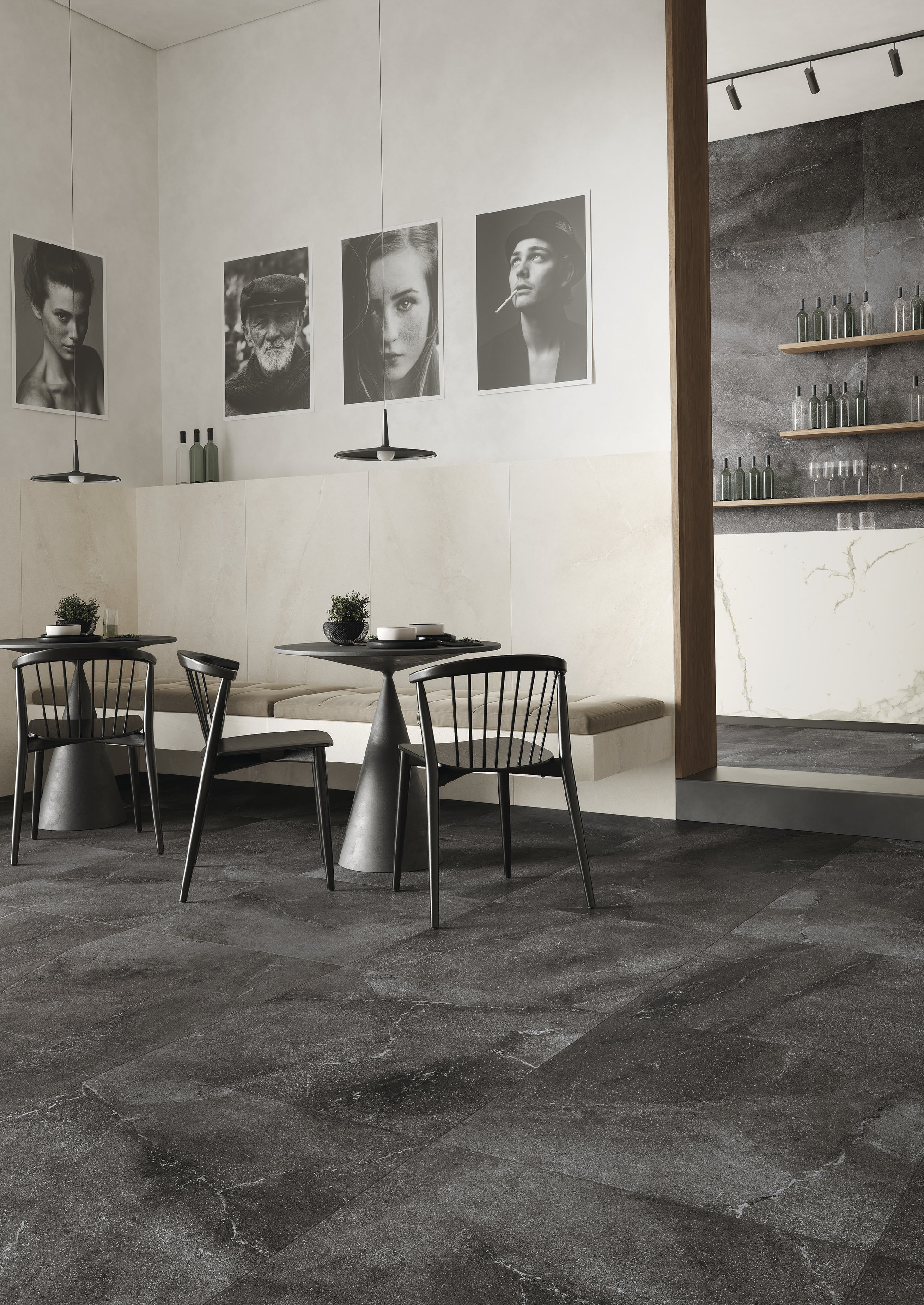 Dunkle, großformatige Bodenfliesen in Steinoptik in einem modernen Café.