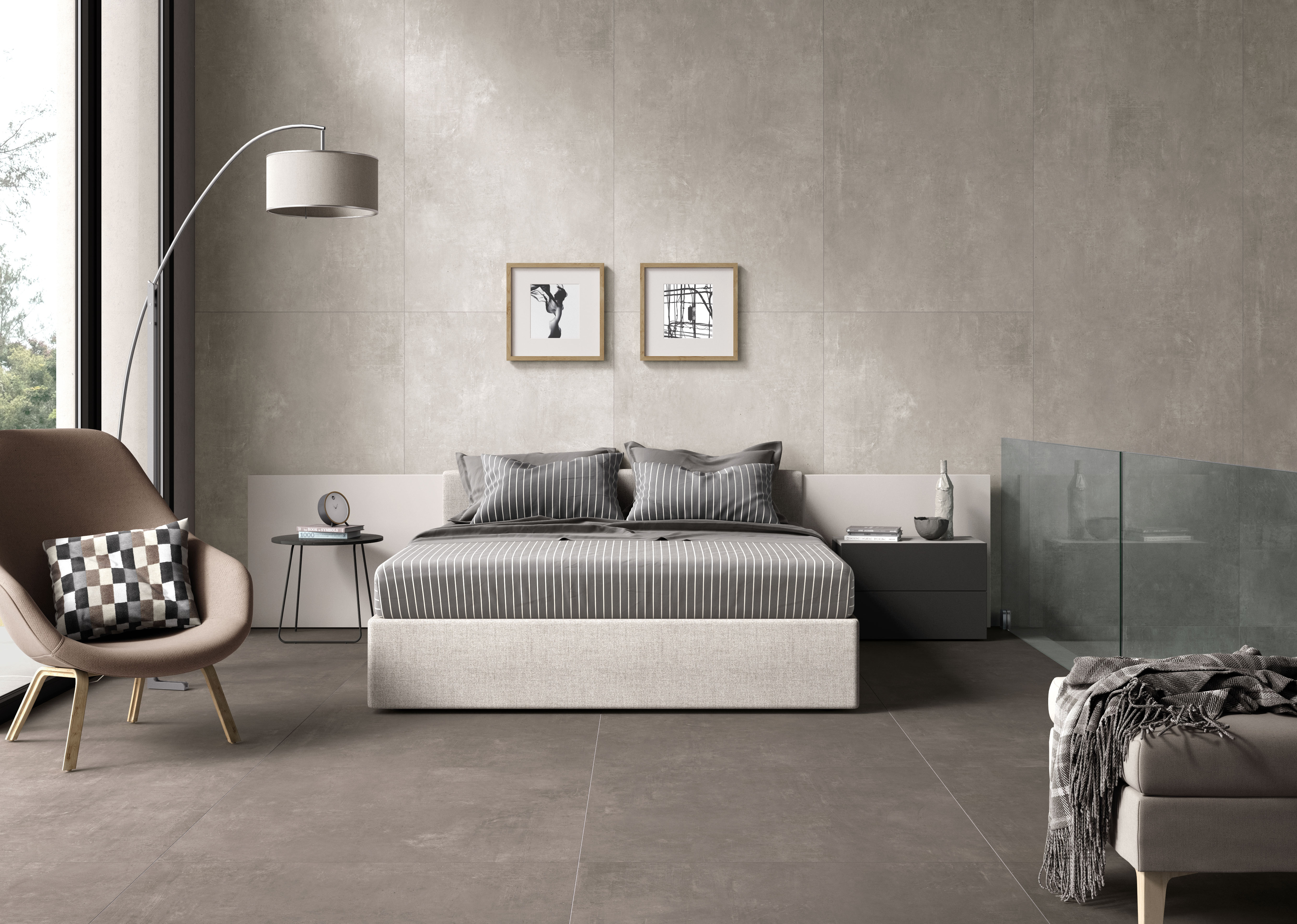 Modernes Schlafzimmer mit großformatigen Fliesen an Boden und Wand.