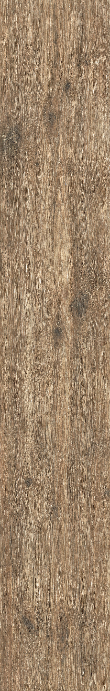 Pure Hazel Carreau en grès cérame allongé, aspect bois chaud, marron.